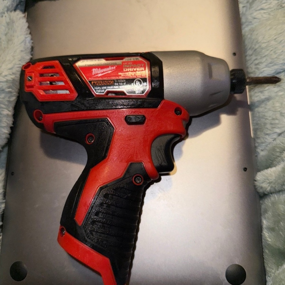Milwaukee Red and Black Cordless Impact Driver